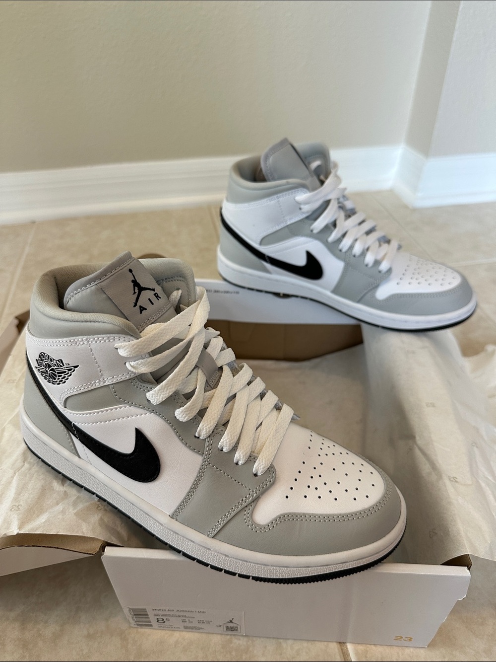 Jordan 1 Mid White, Gray & Black women’s Sneakers